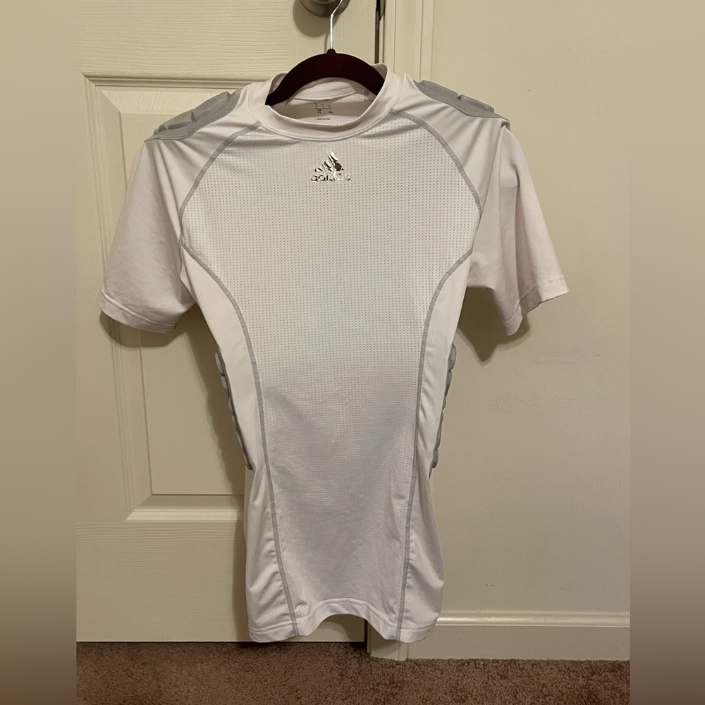 Adidas padded football compression shirt.